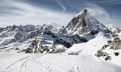 Fototapeta na wymiar view of Matterhorn peak against blue sky Swiss Alps
