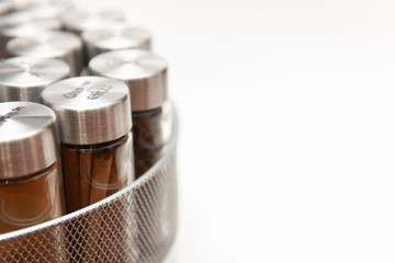 Isolated reusable spice jars on rack