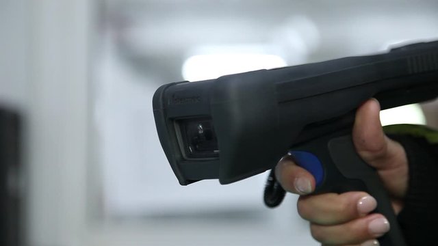 using handheld laser bar code scanner