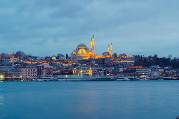 Obraz premium Istanbul, Turkey - Jan 16, 2020: Suleymaniye mosque and passengers Ferry at the Golden Horn, Istanbul, Turkey.