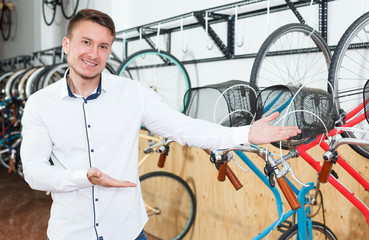 Man is standing satisfied