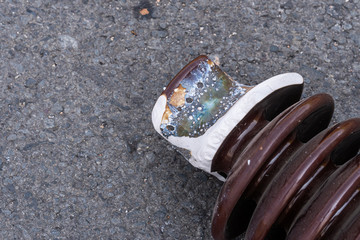 The insulator defective due to short circuit of the high voltage. As a result, the ceramic is...