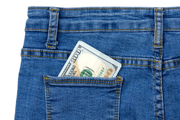 One hundred dollar banknote money in pocket jeans pants background texture. 100 dollar bill close up