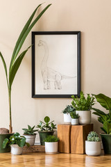 Stylish composition of retro living room interior with a lot of plants in different pots and black mock up poster frame on the beige wall. Vintage home decor. Minimalistic concept. Template.