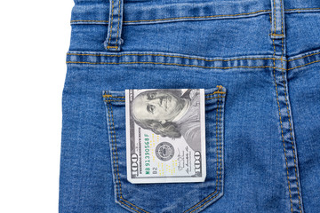 One hundred dollar banknote money in pocket jeans pants background texture. 100 dollar bill close up