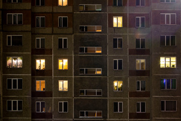 Night view of exterior apartment building. High rise apartments in night light