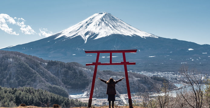 Happy Traveller Woman Raised Arms With Fuji Mountain On Background.