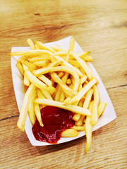 Golden French fries potatoes ready to be eaten