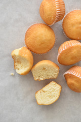 Muffin cake on a parchment paper with copy space. Selective focus. 