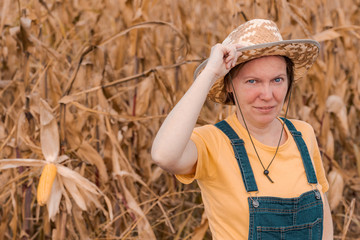 Portrait of female corn farmer in field