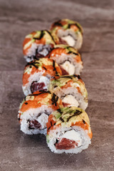 Sushi set with home delivery. Romantic dinner. Sushi in box.