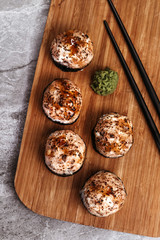 Sushi set with home delivery. Romantic dinner. Sushi in box.