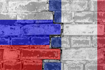 Russia Federation and France - National flags on Brick wall. Governments relations and conflict...