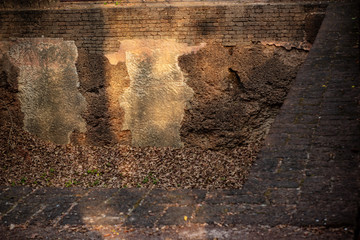 Old brick wall background in old temples in Thailand