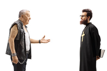 Mature punk talking to a priest