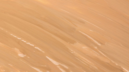 Liquid foundation texture. Make up for women.