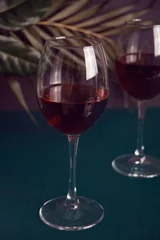 Fotobehang Two glasses with red grape wine. Romantic dinner concept. © zulfiska