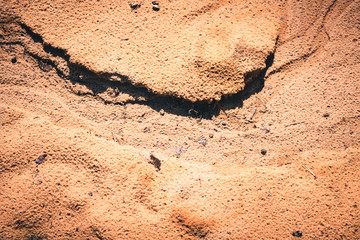 Dried trail from the stream in the sand.