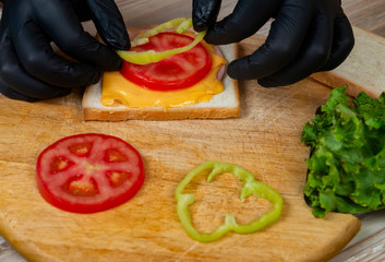 Process of cooking sandwich. variety of fillings and ingredients.Homemade Fast Food concept