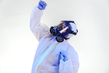 coronavirus epidemic and infectious diseases concept.male lab technician doing research in the lab with protective suit and gas mask.