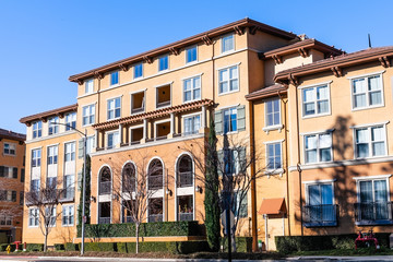 Exterior view of modern apartment building offering luxury rental units in Silicon Valley; San...