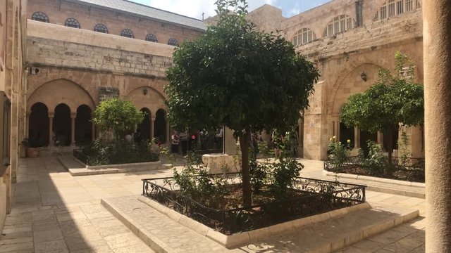 Bethlehem, Palestine - October 20, 2019: Basilica of the Nativity yard with tourists 4K