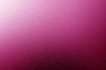 Ground glass texture with light with blur effect in pink tone.