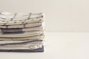 kitchen towels on a wooden background with a copy of the space