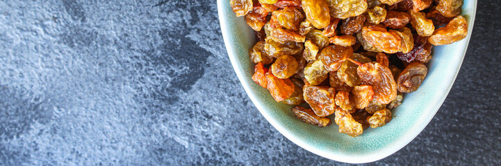 raisins, delicious dried grapes (fresh fruit vitamins) menu concept background. top view. copy space
