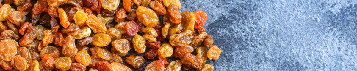 raisins, delicious dried grapes (fresh fruit vitamins) menu concept background. top view. copy space