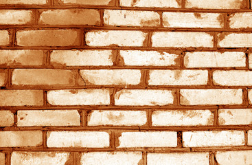 Fototapeta premium Old grungy brick wall texture in orange tone.