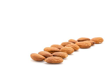 Almond nuts isolated with white background.