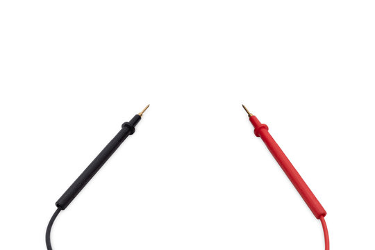 Positive and negative multimeter probe or pin plug isolated on white background, industrial and education concept.