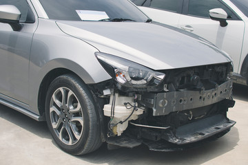 Fototapeta na wymiar BANGSAEN,THAILAND 2019 This mazda silver car waiting for repair on car dealership in garage parked in showroom of automobile automotive for insurance Illustrative editorial image.