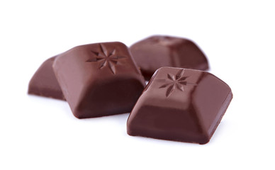 Dark chocolates on white background. Chocolate candies isolated.