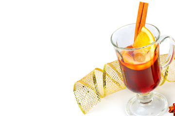 Mulled wine with orange and cinnamon sticks isolated on white . Free space for text.