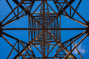 Metal tower supporting power lines