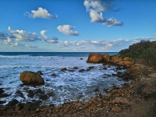 rosky beach on the Gozo island of Malta state, Ramla beach, touristic destination