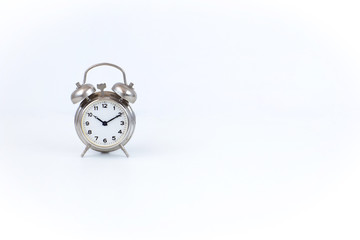 on a white background alarm clock. Free space for text
