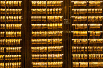 Traditional turkish gold oriental bracelets for women orient background.