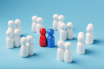 Choosing a sexual partner for love, relationships from such a crowd of monotonous people. A red woman and a blue man in a crowd of white people.