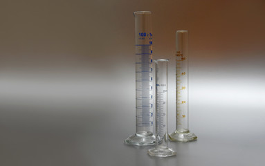 Graduated Cylinder stock images. Glass laboratory equipment. Laboratory accessories. Three...