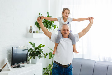 Grandfather meeting his cute granddaughter.