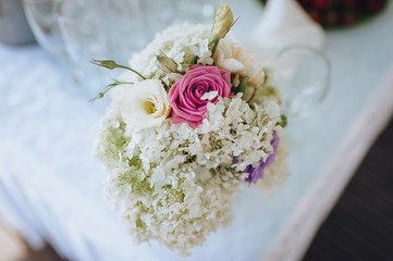 Wedding bouquet of roses, eustomas and wildflowers close-up. Photography, concept.