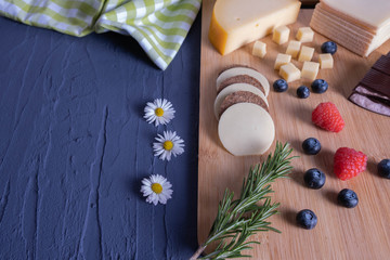 Obraz na płótnie Canvas breakfast with berries, chocolate and chopped cheese