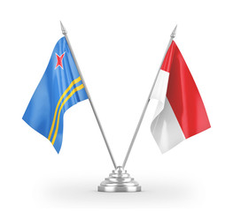 Indonesia and Aruba table flags isolated on white 3D rendering