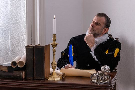 Recreation of a writer of the Spanish Golden Age (1492 to 1659), writing at his desk