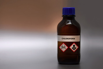 Chloroform in brown laboratory bottle stock images. A bottle of chloroform with inscription. Brown...