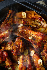 Spicy pork ribs with garlic and barbecue sauce