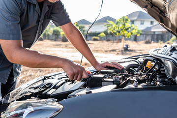 Technician hands of car mechanic in doing auto repair service and maintenance worker repairing vehicle with wrench, Service and Maintenance car check
